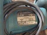 a blue machine with a cord attached to it ' s side