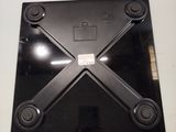 a picture of a picture of a black plate on a wall