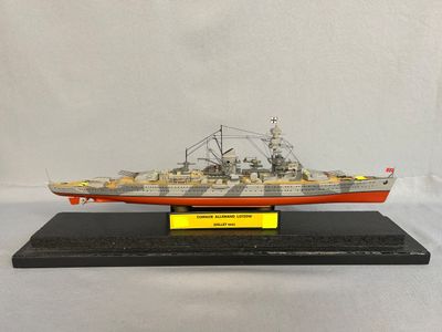 an image of a model of a ship on a stand