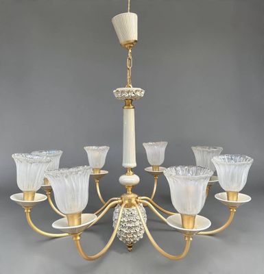 an image of a chandelier with twelve lights and a glass shade