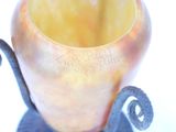 a vase that is sitting on top of a stand