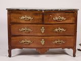 a marble top chest of drawers on a stand