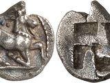 a close up of a coin with a horse on it