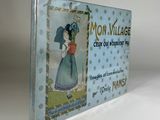 an old book with a picture of a woman in a blue dress