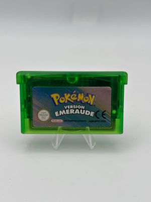a close up of a green nintendo game case with a pokemon logo on it