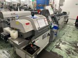 une image représentant une machine dans une usine où se trouvent de nombreuses machines