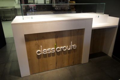 a picture of a glass counter with a glass case behind it