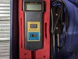 an image of a digital thermometer in a blue box