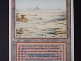 une photo d'une carte illustrée d'un paysage désertique