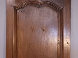 a wooden door with a decorative design on it