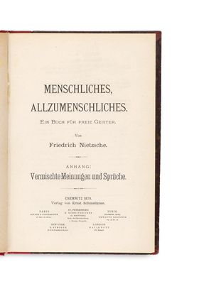 un livre ouvert avec un texte en allemand sur fond blanc