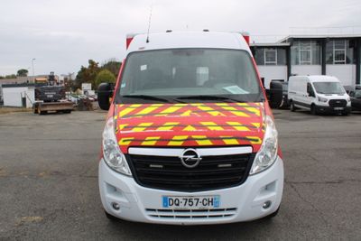 a white van with a red and yellow checkered design on it