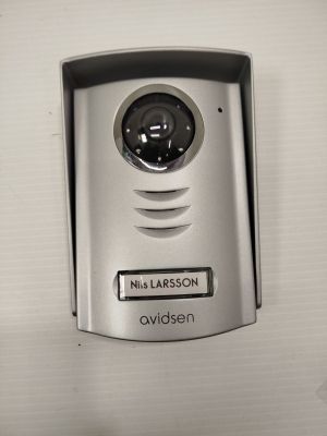 a close up of a video camera mounted on a wall