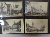 several old black and white photos of a city street and buildings