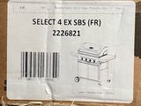 packaging of a bbq with a barcode on the side and a barcode on the back