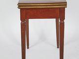 a small table with a wooden top on a white background
