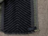 an image of a blanket with a chevroned design on it