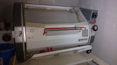 a machine that is sitting in the corner of a room