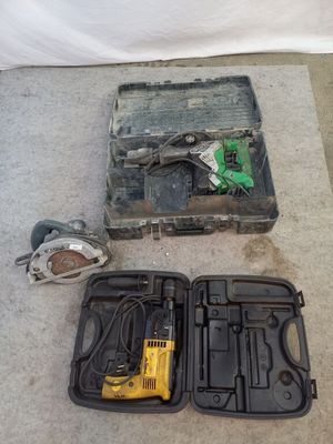 a tool box with a hammer and other tools on the floor