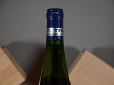 a bottle of wine that is sitting on a table