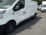 a white van that is parked in a parking lot