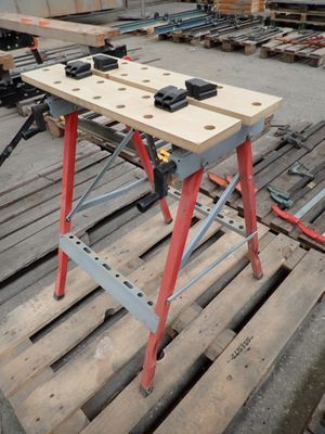 a picture of a workbench with tools on top of it