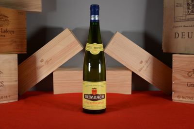 a bottle of wine that is sitting on a table