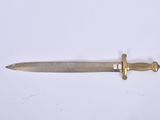 a knife that is laying on a white surface