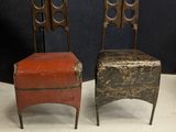 three chairs are sitting next to each other on a white floor