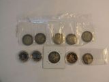 a lot of coins that are sitting on a table