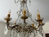 a chandelier hanging from the ceiling in a room