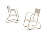 pair of white chairs on a white background with a white background