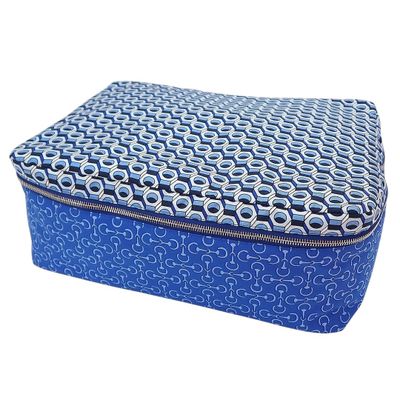 a close up of a blue box with a pattern on it