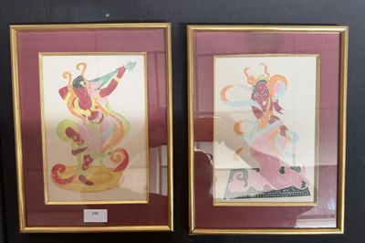 two framed paintings of a woman with a guitar and a man with a guitar