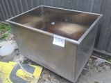 an image of a stainless steel sink on the ground