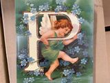 a picture of a card with a picture of an angel on it