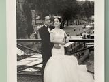 a black and white photo of a man and a woman posing for a picture