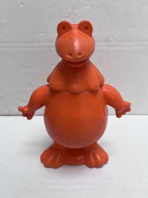 a small toy animal that is standing on its hind legs