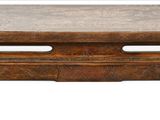 an old wooden tray with a decorative design on it