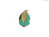 une image représentant une bague en or et turquoise ornée d'une feuille