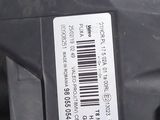 a close up of a car ' s engine with a barcode on it
