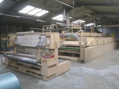 a machine that is working on a sheet of paper