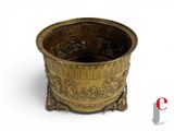 an image of a gold planter on a white background