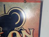 a sign with a picture of a baseball player on it