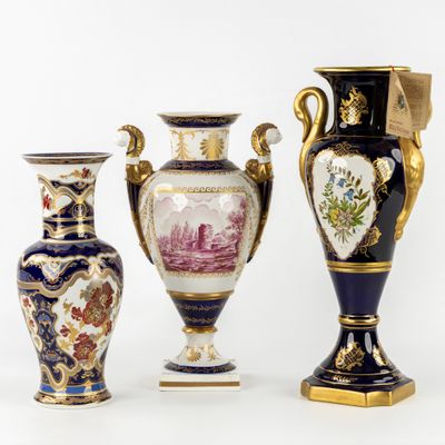 three vases are sitting next to each other on a white surface