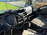 a car that is sitting in the back of a truck