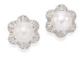 une image d'une paire de boucles d'oreilles en perles et diamants