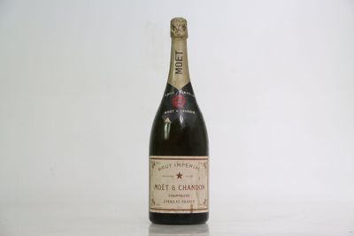 a bottle of wine that is sitting on a table
