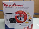 packaging of a blender sitting on top of a table in a room