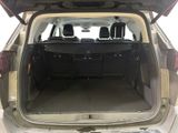 the back of a car with its trunk open showing the cargo area